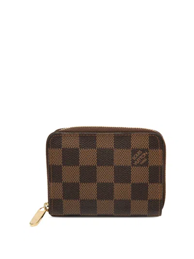 Pre-owned Louis Vuitton 2009 Damier Ebene Zippy Purse Coin Pouch In Brown
