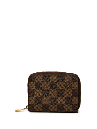 Pre-owned Louis Vuitton 2009 Damier Ebene Zippy Purse Coin Pouch In Brown
