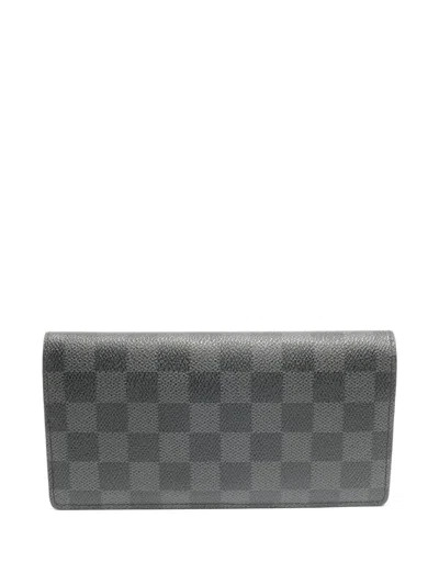 Pre-owned Louis Vuitton 2009 Damier Graphite Wallet In Gray