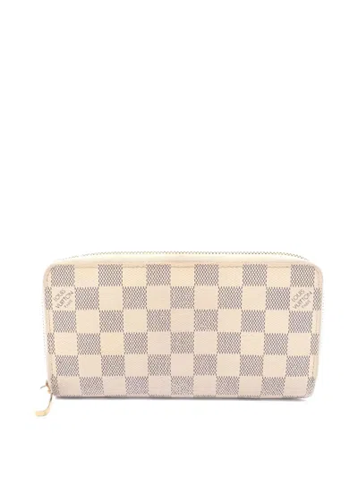 Pre-owned Louis Vuitton 2009 Damier Round Zip Wallet In Neutral
