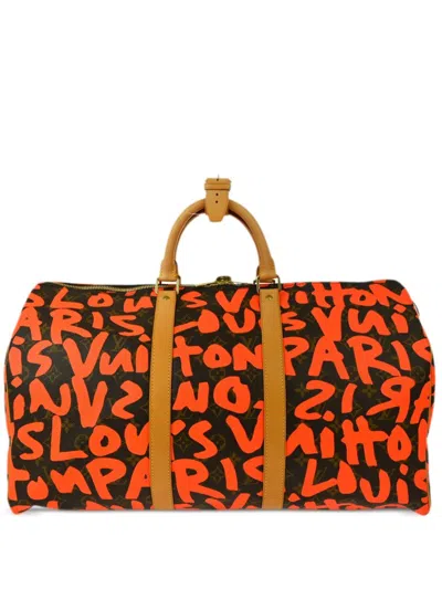 Pre-owned Louis Vuitton 2009 Graffiti Keepall 50 Duffle Bag In オレンジ