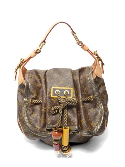 Pre-owned Louis Vuitton 2009 Kalahari Pm Monogram Handbag In Brown