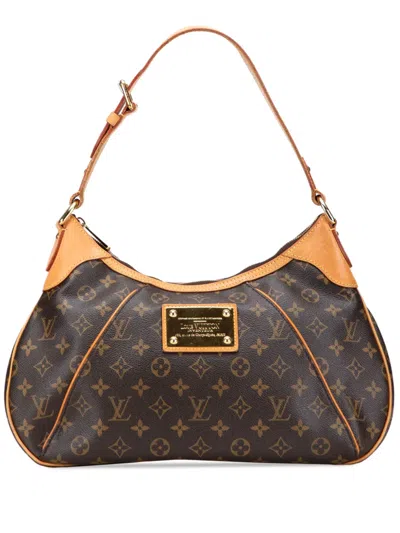 Pre-owned Louis Vuitton 2009 Monogram Thames Gm Shoulder Bag In Brown