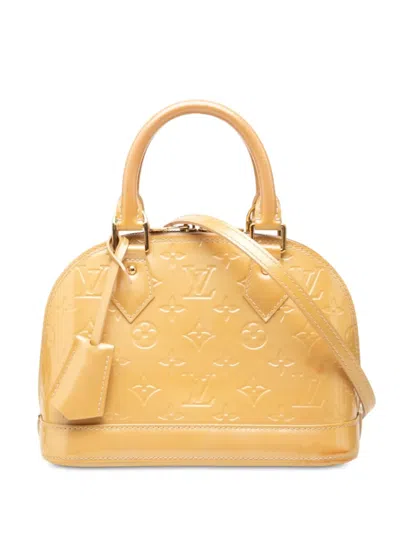 Pre-owned Louis Vuitton 2009 Monogram Vernis Alma Bb Satchel In Yellow