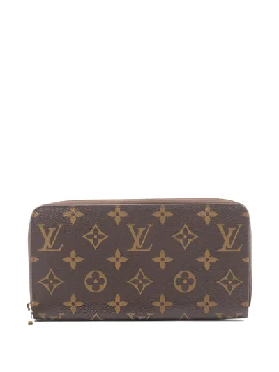 Pre-owned Louis Vuitton 2009 Monogram Zip Wallet In Brown