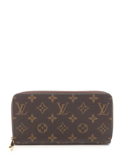 Pre-owned Louis Vuitton 2009 Zippy Wallet In Brown