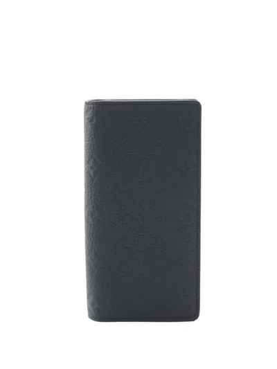 Pre-owned Louis Vuitton 2010-2025 Monogram Taurillon Brazza Wallet Long Wallets In Black
