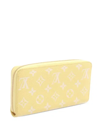 Pre-owned Louis Vuitton 2010-2026 Monogram Empreinte Zippy Wallet Long Wallets In Yellow