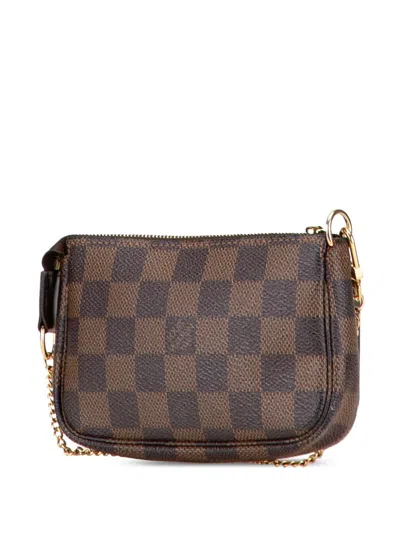 Pre-owned Louis Vuitton 2010 Damier Ebene Mini Pochette Accessoires Handbag In Brown