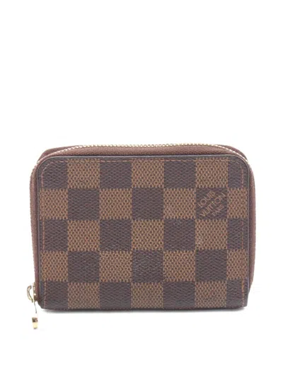 Pre-owned Louis Vuitton 2010 Damier Ebene Zippy Coin Purse In Brown
