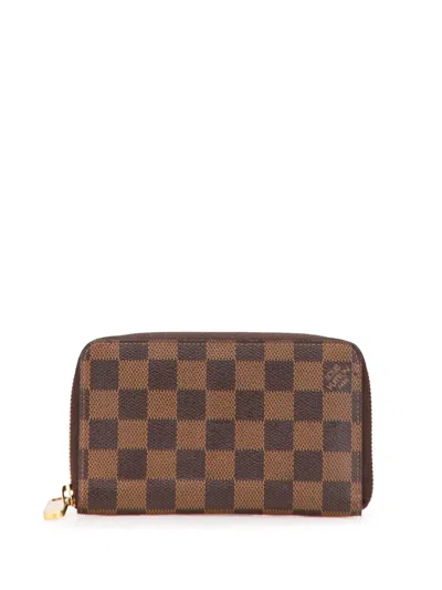Pre-owned Louis Vuitton 2010 Damier Ebene Zippy Compact Wallet Long Wallets In Brown
