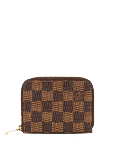 Pre-owned Louis Vuitton 2010 Damier Ebene Zippy Purse Coin Pouch In Brown