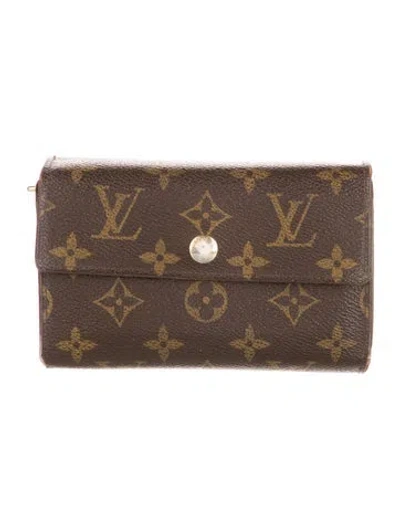 Pre-owned Louis Vuitton 2010 Lv Monogram Wallet In Brown