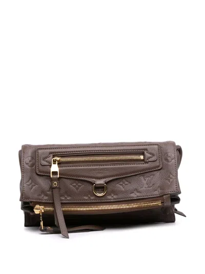 Pre-owned Louis Vuitton 2010 Monogram Empreinte Petillante Clutch Bag In Brown