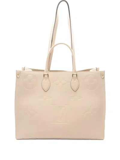Pre-owned Louis Vuitton 2010 On-the-go Gm Monogram Empreinte Tote Bag In Neutral