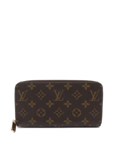 Pre-owned Louis Vuitton 2010 Zippy Wallet In Brown