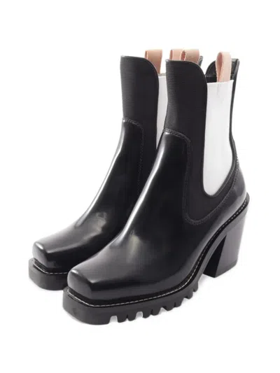 Pre-owned Louis Vuitton 2010s Limitless Line Ankle Boots In Black