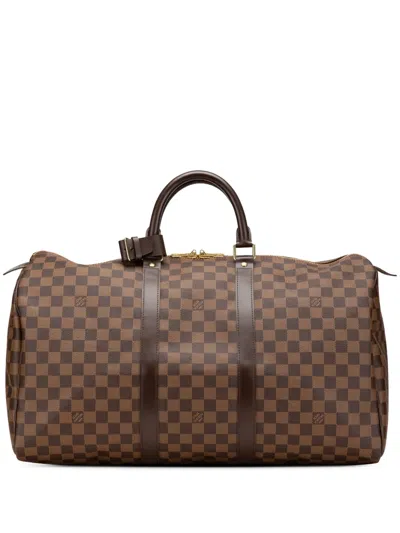 Pre-owned Louis Vuitton 2011 Damier Ebene Keepall 50 Travel Bag In Brown