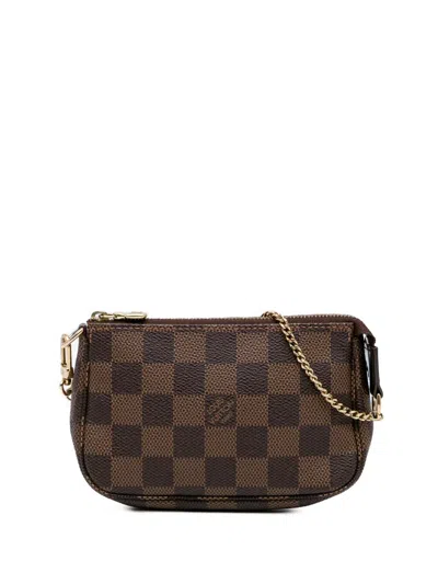 Pre-owned Louis Vuitton 2011 Damier Ebene Mini Pochette Accessoires Handbag In Brown