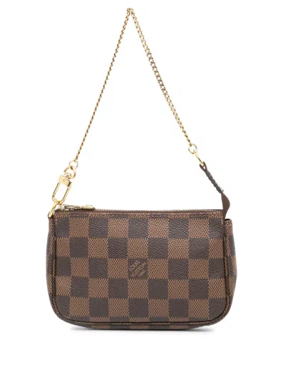 Pre-owned Louis Vuitton 2011 Damier Ebene Mini Pochette Accessoires Handbag In Brown