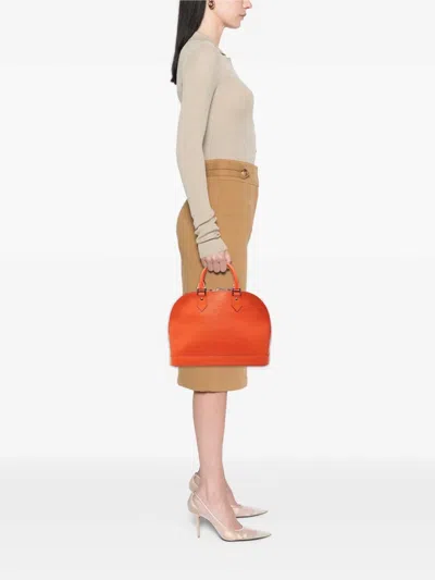 Pre-owned Louis Vuitton 2011 Epi Alma Pm Handbag In Orange