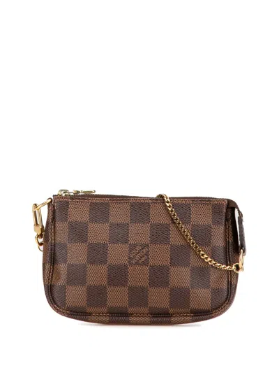 Pre-owned Louis Vuitton 2012 Damier Ebene Mini Pochette Accessoires Handbag In Brown