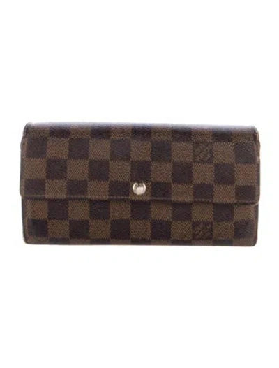 Pre-owned Louis Vuitton 2012 Damier Ebene Pattern Sarah Wallet In Brown