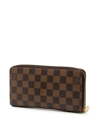 Pre-owned Louis Vuitton 2012 Damier Ebene Zippy Wallet Long Wallets In Brown