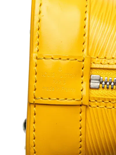 Pre-owned Louis Vuitton 2012 Epi Alma Bb Satchel In Yellow