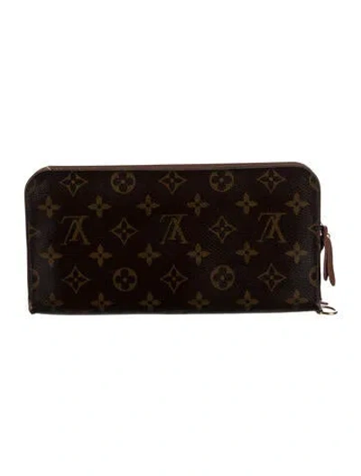 Pre-owned Louis Vuitton 2012 Lv Monogram Zippy Wallet In Brown