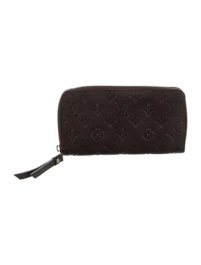 Pre-owned Louis Vuitton 2012 Lv Monogram Zippy Wallet In Brown