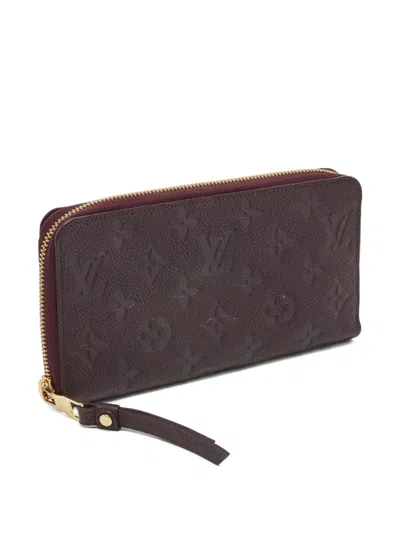 Pre-owned Louis Vuitton 2012 Monogram-empreinte Wallet In Purple