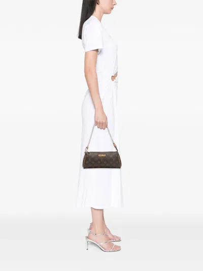 Pre-owned Louis Vuitton 2012 Monogram Eva Satchel In Brown