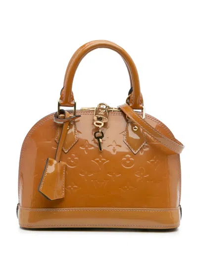 Pre-owned Louis Vuitton 2012 Monogram Vernis Alma Bb Satchel In Brown