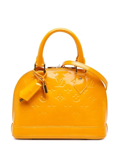 Pre-owned Louis Vuitton 2012 Monogram Vernis Alma Bb Satchel In Yellow