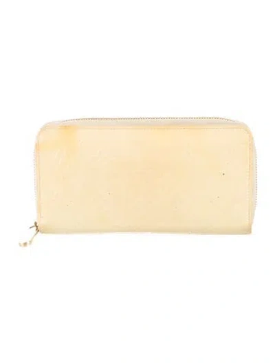 Pre-owned Louis Vuitton 2012 Monogram Vernis Zippy Wallet In Yellow