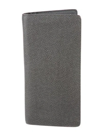 Pre-owned Louis Vuitton 2012 Taiga Leather Brazza Wallet In Gray