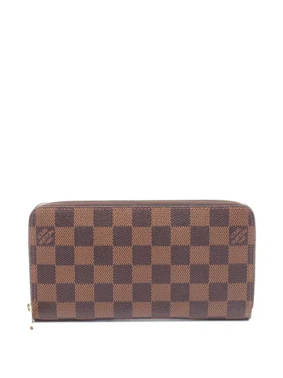 Pre-owned Louis Vuitton 2012 Zippy Wallet In Brown