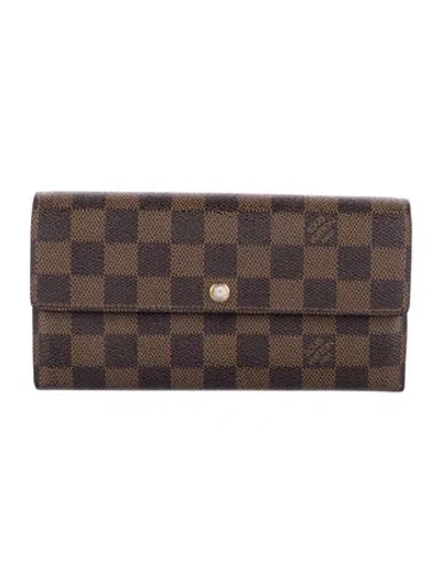Pre-owned Louis Vuitton 2013 Damier Ebene Pattern Sarah Wallet In Brown
