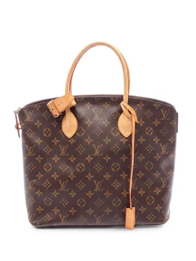 Louis Vuitton 2013 Lockit Mm Leather Handbag In Brown