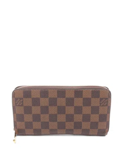 Pre-owned Louis Vuitton 2013 Zippy Wallet In Brown