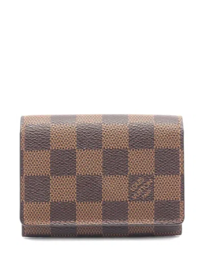 Pre-owned Louis Vuitton 2014 Damier Ebene Canvas Wallet In Brown