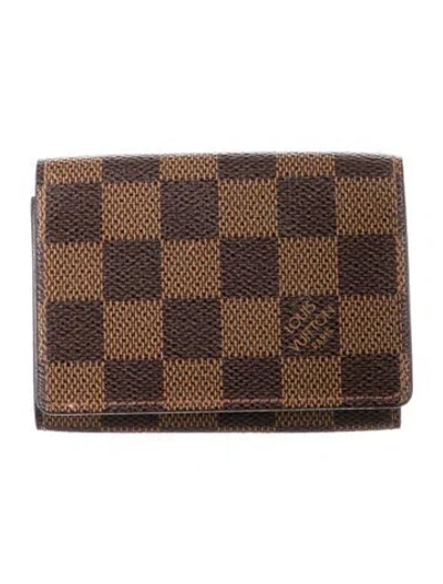 Pre-owned Louis Vuitton 2014 Damier Ebene Pattern Card Case In Brown