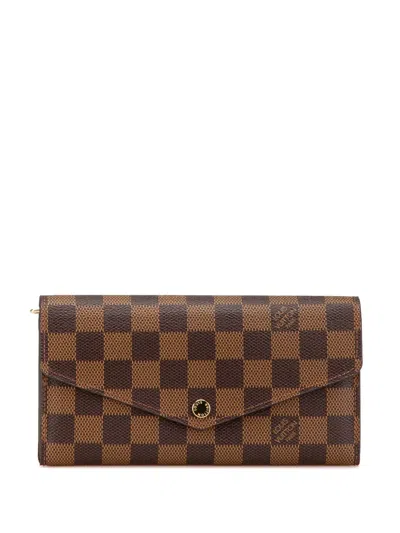 Pre-owned Louis Vuitton 2014 Damier Ebene Sarah Wallet Long Wallets In Brown