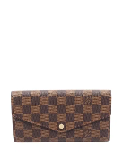 Pre-owned Louis Vuitton 2014 Damier Ebene Sarah Wallet Long Wallets In Brown
