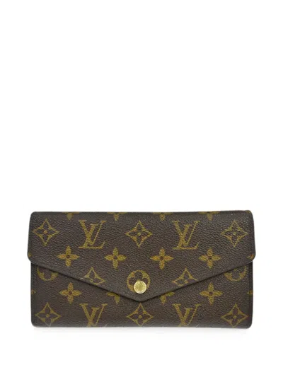 Pre-owned Louis Vuitton 2014 Monogram Portefeuille Sarah Wallet In Brown