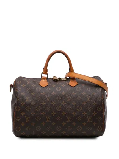 Pre-owned Louis Vuitton 2014 Monogram Speedy Bandouliere 35 Satchel In Brown