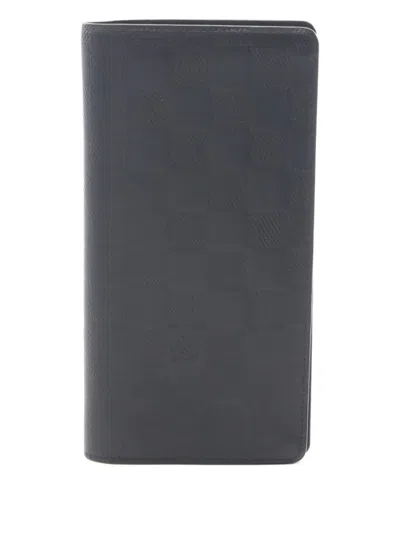 Pre-owned Louis Vuitton 2014 Portefeuil Brother Monogram Wallet In Black