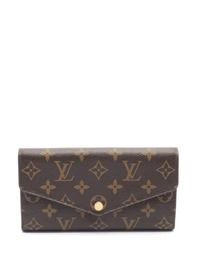 Pre-owned Louis Vuitton 2014 Sara Long Wallet In Brown