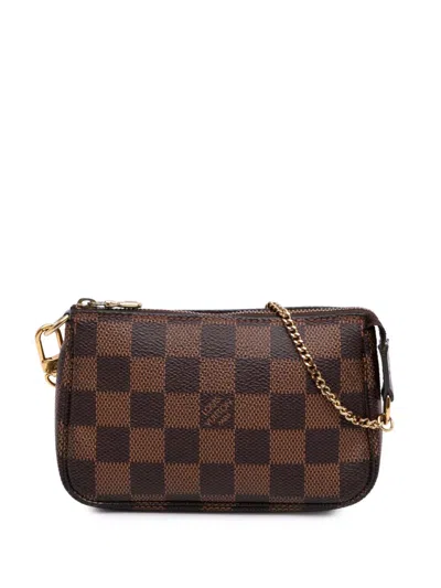 Pre-owned Louis Vuitton 2015 Damier Ebene Mini Pochette Accessoires Handbag In Brown